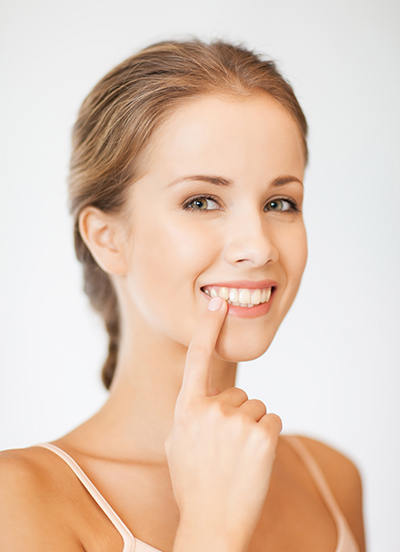 woman with black triangle on her teeth