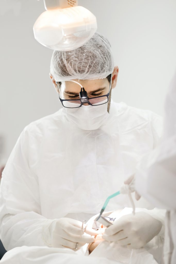 Dentist performing procedure
